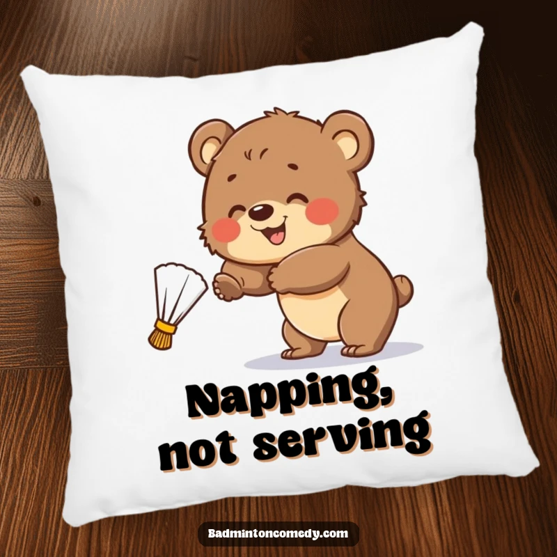 Funny Pillow: A smiling bear cub attempts to hit a badminton shuttlecock, bringing cuddly sports humor to soft furnishings.