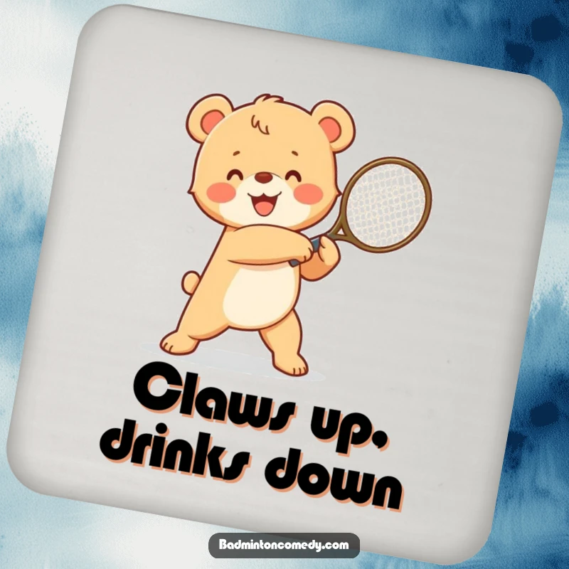 Funny happy bear cub in a winning pose, swinging a tennis racket, a humorous and protective drink coaster.