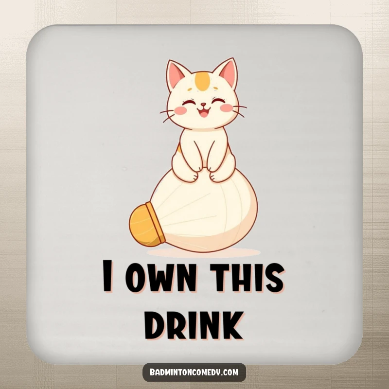 Funny coaster featuring a proud, happy cat character sitting on a giant shuttlecock, a regal addition to protect surfaces.
