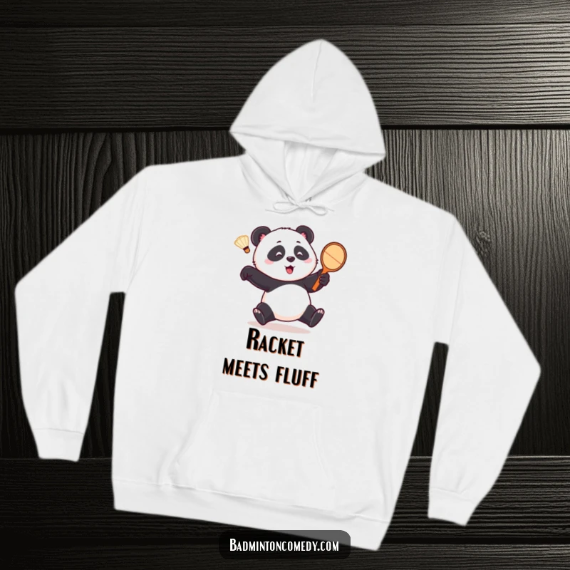 Funny panda hoodie, a playful bear comically chasing a shuttlecock with a racket, showcasing its humorous dedication to the game.