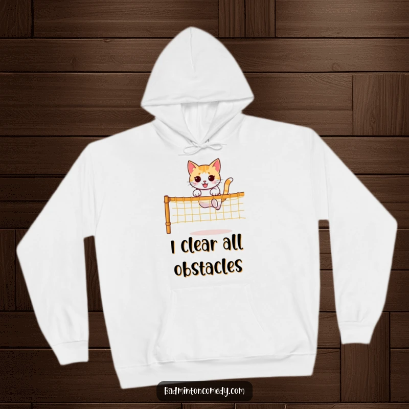 Funny hoodie featuring a determined cat character executing an impressive jump over a net, showcasing its athletic capabilities.