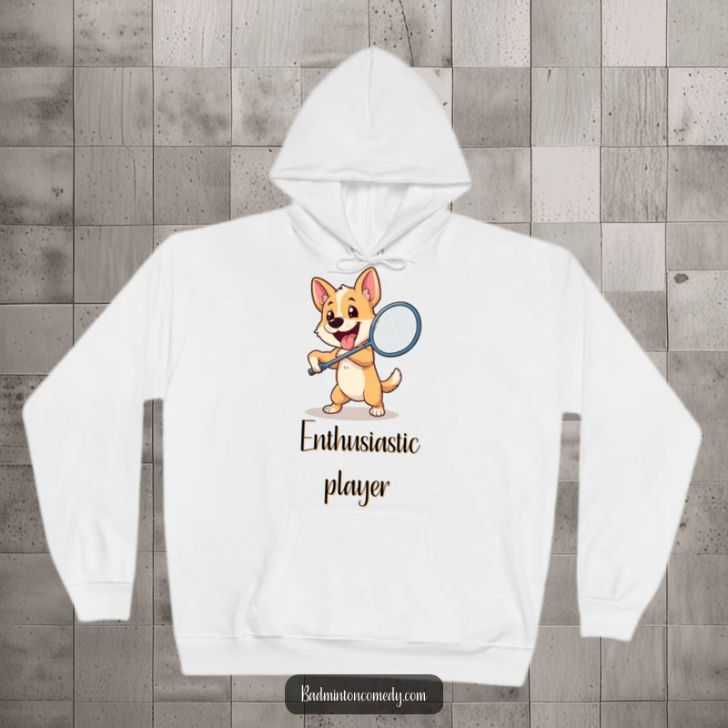 Funny Dog Badminton Hoodie: A happy dog enthusiastically swings a badminton racket with great power, ready to hit the shuttlecock.
