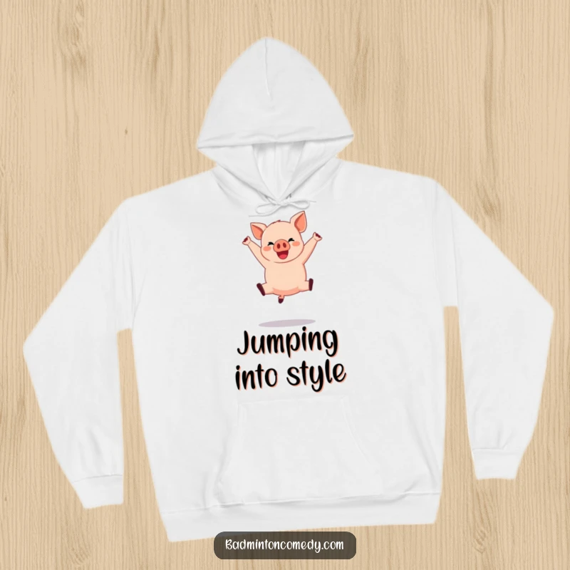 Funny Pig Basketball Hoodie: A happy pig performing a dramatic mid-air jump shot, designed for cozy wear and athletic fun.