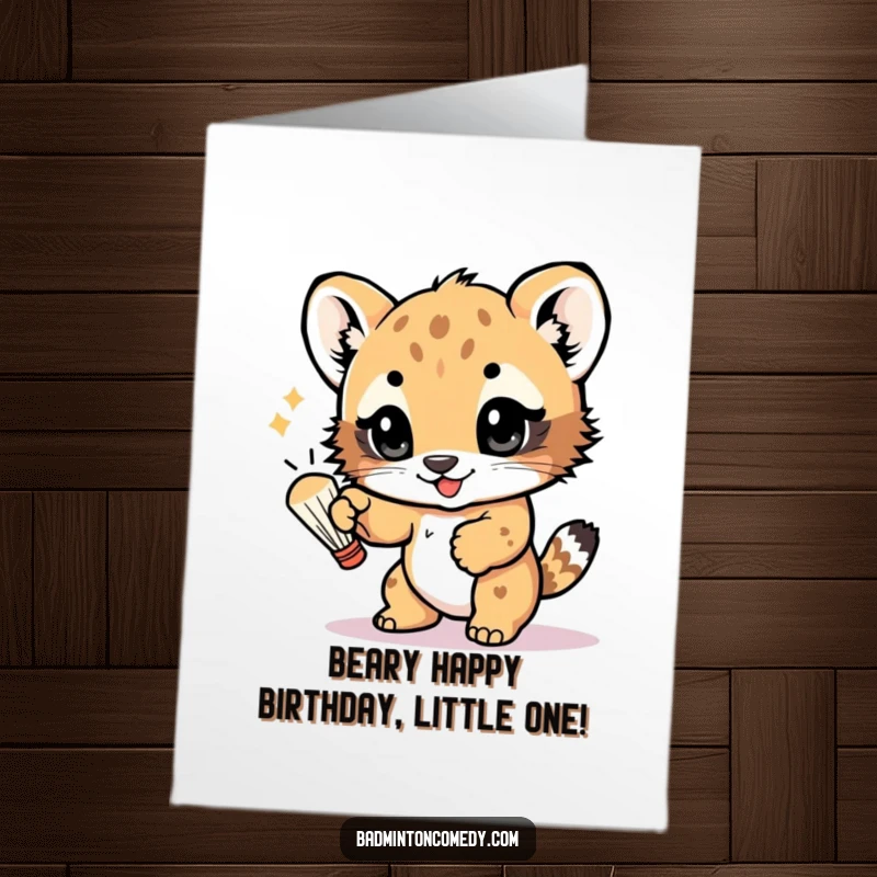 Funny Free Printable Birthday Card: A playful cub bats a shuttlecock with its paw, eyes sparkling with joy.