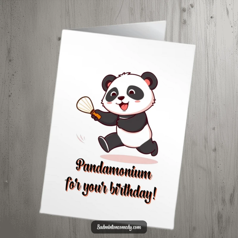 Funny Free Printable panda gleefully chasing a shuttlecock on a birthday card, ready for action.