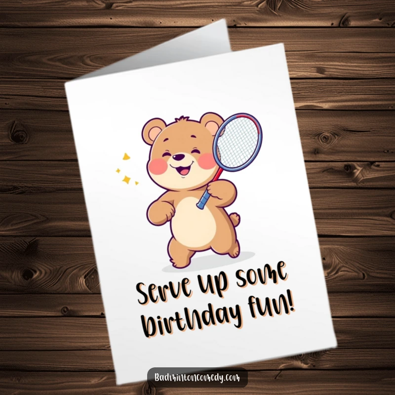 Funny free printable birthday card showing a happy bear swinging a badminton racket with great energy and a big grin.