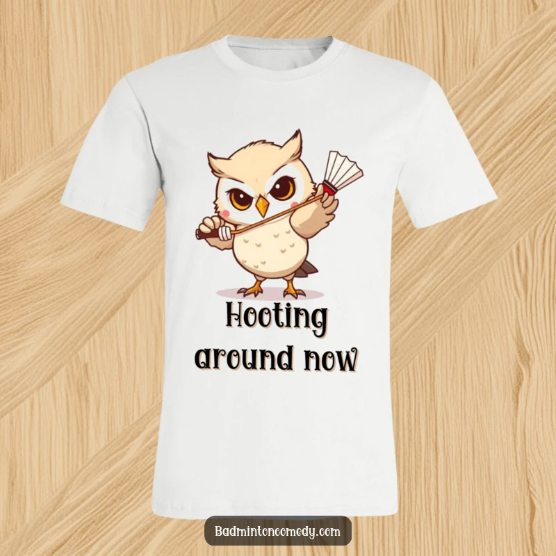 Funny Owl Badminton T-Shirt: A determined owl with a concentrated gaze, poised to strike a shuttlecock with precision.