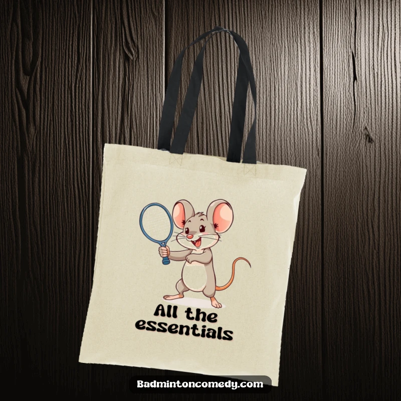 Funny mouse executing a powerful smash with a racket on a tote bag, conveying athletic humor.