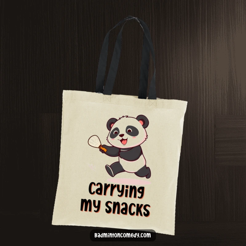 Funny panda energetically chasing a shuttlecock on a badminton court, featured on a practical and humorous tote bag.