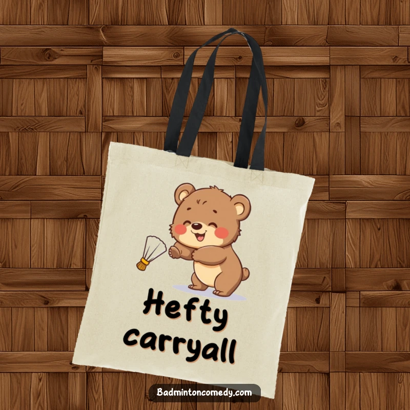 Funny Tote Bag: A smiling bear cub is about to hit a badminton shuttlecock, showcasing athletic spirit with cuteness.